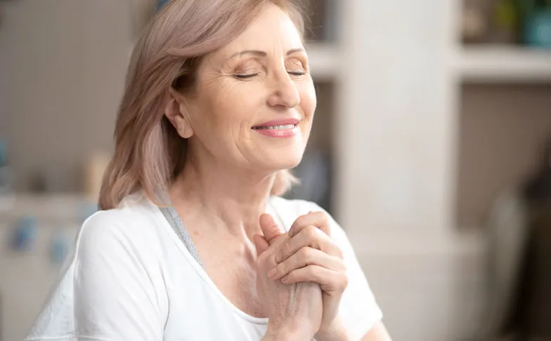 An older female client learning about the root cause of psychiatric symptoms