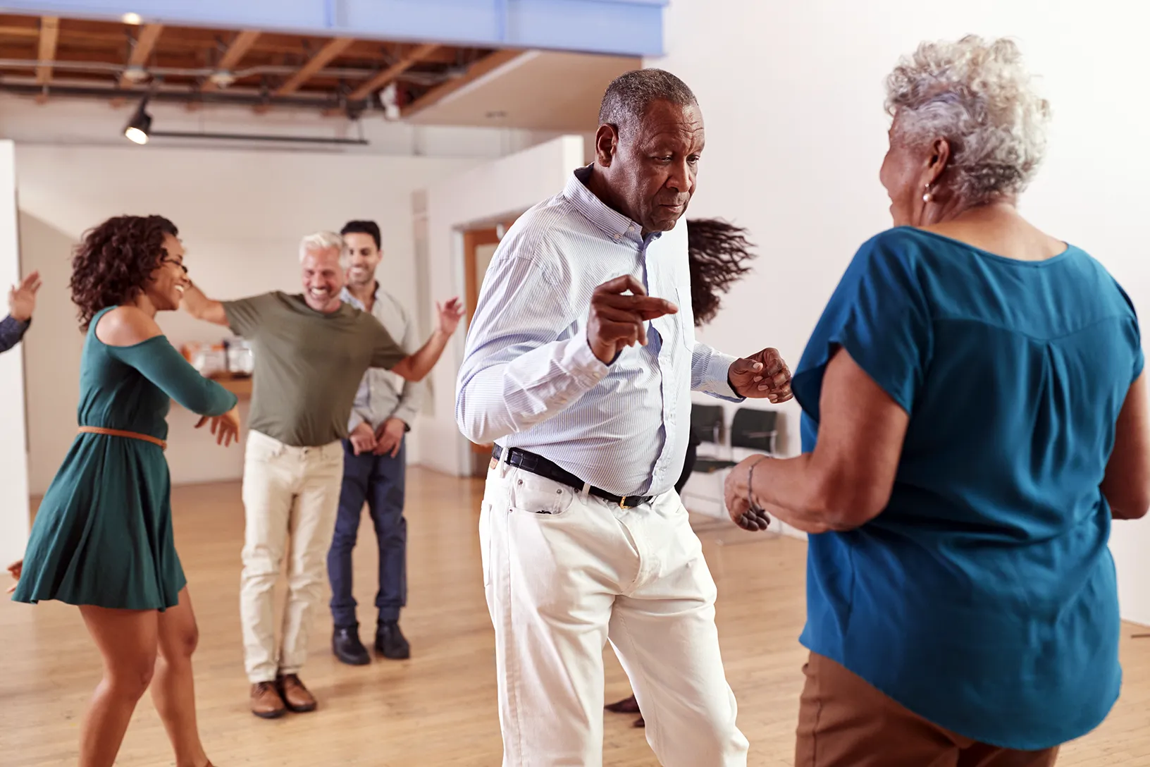 people engaged in dance therapy for mental health