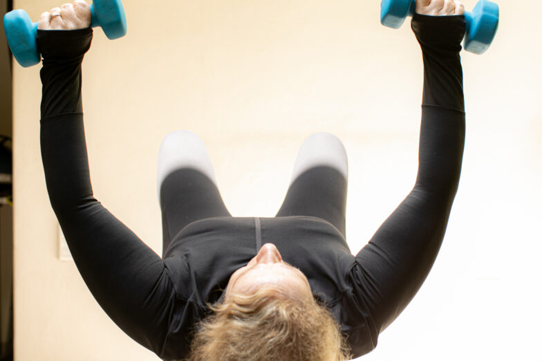 Dr. Leslie Korn training to build muscle.