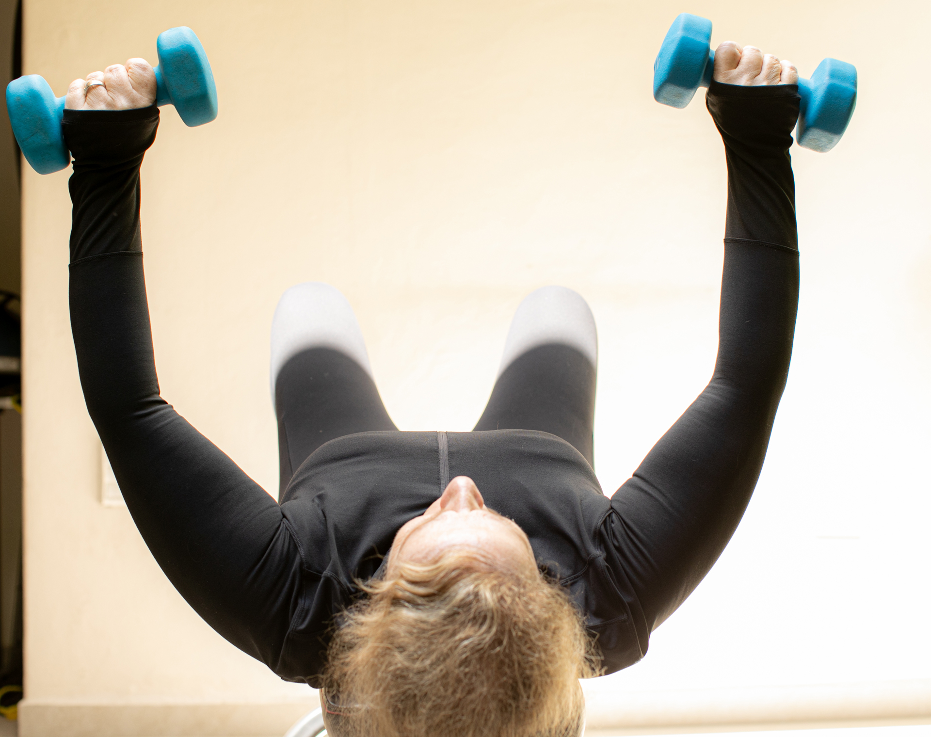 Dr. Leslie Korn training to build muscle.