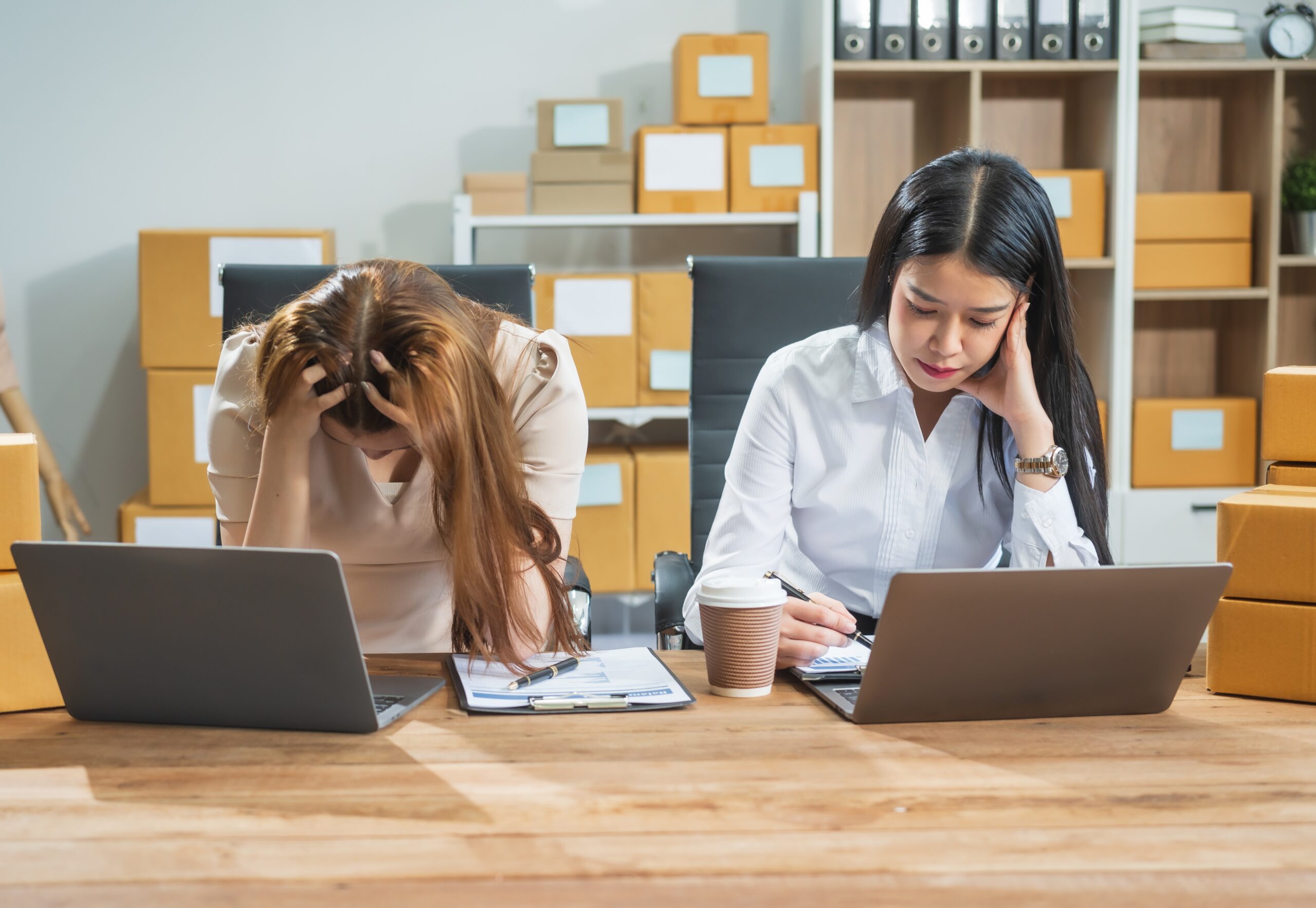 Two women experience stress in an environment with artificial light that disrupts their circadian rhythm