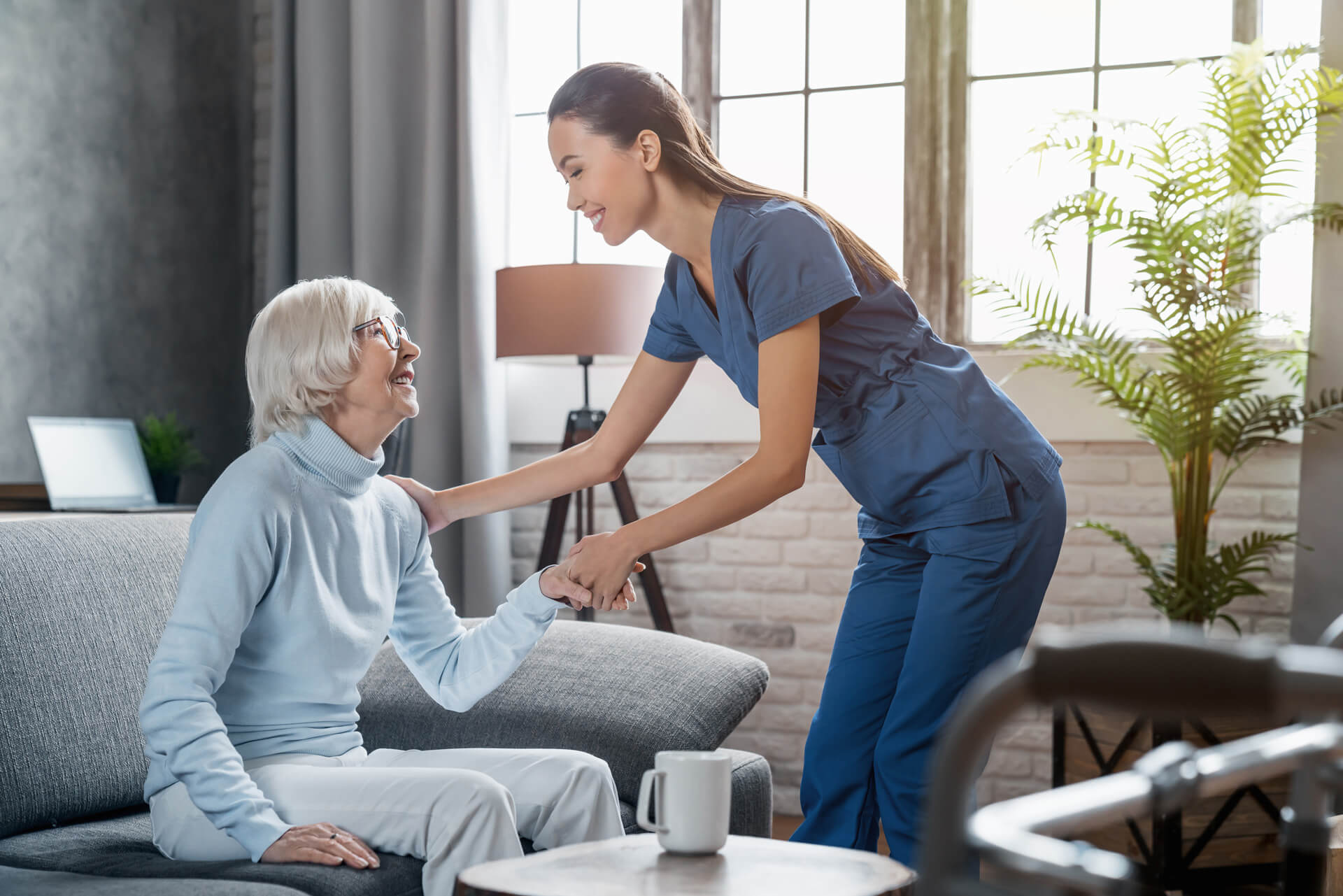 Happy female professional caregiver taking care