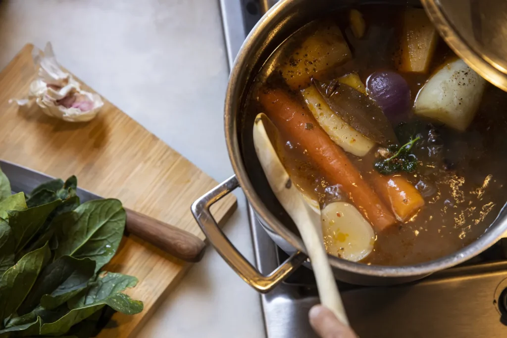 Default ALT text for stirring-a-pot-of-hearty-vegetable-soup-on-the-sto-2025-04-04-08-42-23-utc_result